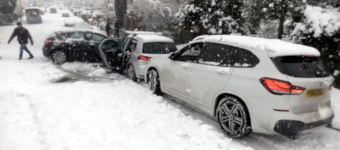Cars slipping, sliding and crashing in heavy snow in Gloucestershire