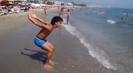 Flipping beach guy